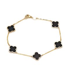 14K SOLID YELLOW GOLD ONYX FOUR LEAF CLOVER BRACELETHere is a Beautiful , delicate and simple, yet classy Clover bracelet . This is 14k Solid Yellow Gold. ( We do not sell filled or plated jewelry) Perfect for everyday use.Clover Dimension : 10mm Chain Length : 7 Inches Bracelet Weight : 1.9gr --NICE THICK CHAIN WITH LOBSTER CLAW--Absolutely stunning. Comes in a gift box. Star Wedding Band, Four Leaf Clover Bracelet, Clover Bracelet, Four Leaves, Band Jewelry, Four Leaf, Leaf Clover, Four Leaf Clover, Engraved Rings