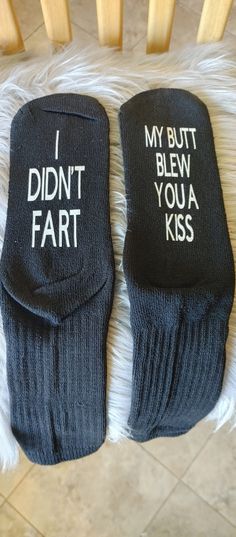 two pairs of socks that say i didn't fart