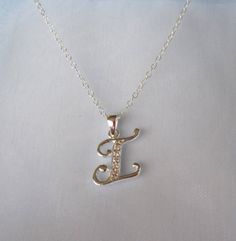 925 sterling silver Monogram INITIAL LETTER I with cz stones personalized charm with chain necklace.Pendant and chain - 925 sterling silver (hallmarked). Please choose the length of the chain from the menu.The pendant (without the bail) is 14mm x 12mm (0.55" x 0.47").The necklace comes bubble wrapped and gift wrapped in a complementary organza bag. Silver Cubic Zirconia Initial Necklace For Gift, Silver Cubic Zirconia Initial Pendant Necklace, Silver Cubic Zirconia Pendant Name Necklace, Silver Cubic Zirconia Pendant Necklace, Personalized Silver Initial Necklace With Cubic Zirconia, Silver Cubic Zirconia Initial Necklace, Sterling Silver Initial Necklace With Name, Personalized Silver Cubic Zirconia Charm Necklaces, Silver Hallmarked Initial Pendant Name Necklace