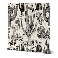 a black and white cactus pattern on a canvas wall art print with various cacti