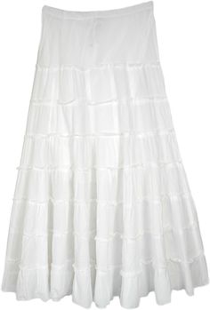 As white as snow, this lovely tiered cotton skirt is the perfect match for someone who likes a feminine yet comfortable style.  With its soft and gentle voile cotton fabric, the skirt has an eight-tiered look has an refined look and the skirt is lined up with the same fabric to the knee. #tlb #XLPlus #Misses #TieredSkirt #MaxiSkirt #Summerskirt #whiteskirt Summer Tiered Lined Maxi Skirt, White Tiered Maxi Skirt For Spring, White Flowy Tiered Maxi Skirt, Tiered Maxi Skirt With Layered Hem, White Ruffled Flared Maxi Skirt, White Tiered Skirt For Spring, White Tiered Gathered Maxi Skirt, Flowy White Skirt With Ruffle Hem, White Flowy Skirt With Ruffle Hem