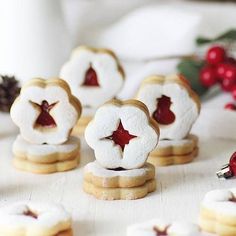 cookies decorated with white icing and red stars