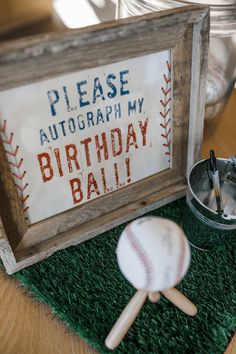 a baseball themed birthday party with an old sign