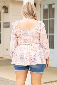 Everything will be just peachy when you wear this amazing top! This cutie has a super flattering smocked bodice with adorable ruffles on the shoulders! The floral pattern is so stunning and the peach color is neutral enough to pair with all of your faves! Style this with jean shorts and sandals for a super cute look! 100% Polyester Feminine Flowy Smocked Top With Floral Print, Feminine Ruffled Peasant Top With Square Neck, Feminine Fall Smocked Top With Floral Print, Feminine Floral Smocked Top For Fall, Feminine Smocked Top For Brunch, Pink Floral Smocked Top For Spring, Feminine Pink Smocked Top For Fall, Feminine Smocked Top With Ruffles For Spring, Pink Smocked Top With Floral Print For Brunch