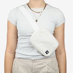 Our Fanny Pack is created intentionally with a slim and stylish design that is perfect for everyday use. It is ideal for those looking for a sleek and cool belt bag to carry only the essentials, whether youre traveling, going to concerts and sporting events, or simply running errands. Trendy White Chest Bag For On-the-go, Casual Belt Bag With Zipper Pouch For On-the-go, Casual Belt Bag For Summer On-the-go, Casual Rectangular Belt Bag With Adjustable Strap, Casual Rectangular Belt Bag For On-the-go, White Rectangular Chest Bag, Trendy White Chest Bag For Everyday, Casual White Chest Bag For Everyday, Casual Rectangular Belt Bag With Zipper