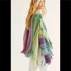 Free People Cool And Cozy Pullover Designed In A Multicolored Knit Fabrication With Dropped Dolman Sleeves And Bottom Fringe Detail In A Boxy, Slouched Silhouette. Effortless Pull-On Style Exaggerated Side Slits Wide Neckline Feature Size M Bohemian Knit Top For Fall, Bohemian Long Sleeve Knitted Top, Bohemian Knitted Tops For Fall, Bohemian V-neck Sweater, One Size Green Knit Sweater, Bohemian Crew Neck Knit Sweater, Bohemian Knit Tops For Winter, Bohemian Knitted Tops For Layering, Bohemian Long Sleeve Textured Knit Tops