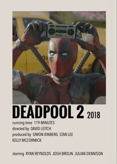 deadpool 2 movie poster with deadpool holding up radio headset in front of his face