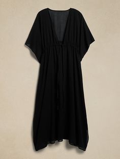 Kaftan Swim Coverup | Banana Republic Factory Casual V-neck Beach Poncho, Spring Vacation V-neck Poncho, Oversized Black Summer Poncho, Casual Black Summer Poncho, Casual Flowy Cover-up For Resort Season, Chic Beach Dress With Batwing Sleeves, Chic Beach Cover-up Poncho, Casual Cover-up For Brunch On Vacation, Oversized Poncho With Batwing Sleeve For Vacation