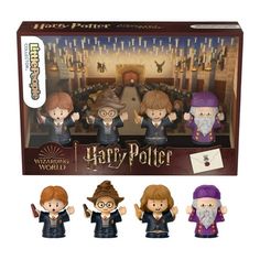 three harry potter figurines are in the box