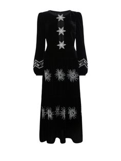 The Camille dress in black with embellished pearl stars is a midi length dress in a luxury liquid velvet that features an alluring split neckline held together by three decorative stars. Each is densely hand-embroidered with crystals, beads, and faux pearls to create a unique trompe l’oeil effect. It features a fitted bust and gathered waist into a flowing midi-length skirt, with romantic blouson sleeves elegantly fastened with a contrast-covered button cuff. Fully lined and invisible zip closure at center back. Model is 180 cm/ 5'9'' tall and wears a UK size 8. Composition & Care: 82% Rayon, 18% Silk. Delicate Dry Clean Only. Stars Dress, Camille Dress, Crystals Beads, Cap Fashion, Midi Length Skirts, Star Dress, Midi Length Dress, Lingerie Sleepwear, Velvet Dress