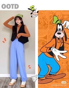 a woman standing in front of a cartoon character wallpaper and wearing blue wide legged pants