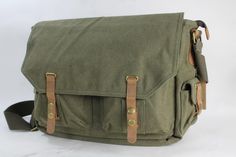 "Free Engrave Option on Selected Items. Product important information External dimension: 15 * 9 * 6\", weight 2 lb. 2 front pockets under flat over panel; button closure Space room, laptop cushion can fit laptops up to 15\" width Zipper closure; internal pocket and pen holders Vintage brass fitting hardware; 16oz durable thick canvas ---------------------------------------------- About the engraved details 1 * Note: this model can be engraved on the large leather panel on the front pocket or a Canvas Laptop Bag, Leather Patterns, Leather Panel, Space Room, Canvas Messenger Bag, Brass Fittings, Leather Pattern, Bag Canvas, Shoulder Messenger Bag