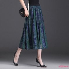 Elegant Floral Print Wraparound Gown with Flowing Skirt and Comfortable Fit Green A-line Dress With Lined Skirt, Green Flowy Midi Skirt Dress, Green Flowy Midi Skirt, Green Long Pleated Skirt Dress, Green Long Pleated Dress, Elegant Flared Multicolor Maxi Skirt, Elegant Multicolor Flared Maxi Skirt, Elegant Multicolor Flared Skirt, Gown Pattern