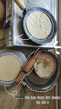 two pans filled with food sitting on top of a counter next to each other