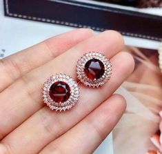 Welcome to Elegant Art Jewelry!  Stone: Natural Red Garnet Stone Size: ( Pendent: 8mm×8mm ), ( Ring: 8mm*8mm ), ( Earrings: 8mm*8mm ) Side Stone: Zircon Metal: 925 Sterling Silver Personalization: 9K/14K/24K/GOLD/SILVER/PLATINUM/ROSE-GOLD/WHITE GOLD. (Contact me)  Red Garnet Pendant, Red Garnet Cuff Pendant, 925 Sterling Silver Pendant, Oval Shape Pendant, Red Garnet Pendant, Red Garnet Engagement, Open Design Pendant, Red Garnet Oval, Emerald Red Garnet, Red Garnet, Red Gemstone, Gemstone Penda Luxury Red Round Cut Jewelry, Luxury Red Jewelry With Halo Setting, Red Round Cut Garnet Jewelry, Red Garnet Round Cut Jewelry, Fine Jewelry Red Round Cut, Aaa Quality Red Jewelry For Formal Occasions, Formal Red Jewelry With Round Gemstone, Red Round Stone Jewelry For Formal Occasions, Red Round Jewelry For Valentine's Day