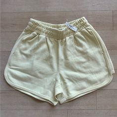 - Madewell Dolphin Hem Shorts Botanical Dye Edition - Color: Daffodil Yellow Solid (Light Pale Pastel Yellow) - Size Small - Regular Fit, High Rise - Easy Pull-On Shorts With A Cool Curved Hem - 100% Regenagri Certified Cotton (Cozy Cotton Terry) - Hidden Drawstrings On Inside Of Waistband - New With Tag, Nwt, Never Worn, No Flaws. Just Prefer Something Shorter. - 12.5” Across Waist (Unstretched), Up To 19.5” Across Waist (Stretched), 11.5” Rise, 4” Inseam, 12.75” Outseam Spring Leisure Bottoms With Elastic Waistband, Yellow Leisure Bottoms For Summer, Spring Leisure Shorts, Relaxed Fit Bottoms For Leisure In Spring, Relaxed Fit Bottoms For Spring Leisure, Casual Yellow Shorts For Leisure, Comfortable Bottoms With Built-in Shorts For Spring, Comfortable Green Bottoms For Spring, Comfortable Green Spring Bottoms