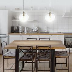 a kitchen table with four chairs in front of it and an oven on the other side