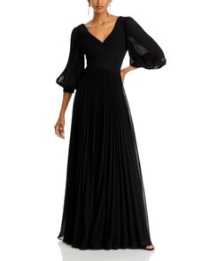 Teri Jon by Rickie Freeman Chiffon Pleated V Neck Gown V-neck Gown With Sheer Sleeves For Evening, Evening Chiffon Gown With Pleated Bodice, Formal Silk Maxi Dress With Sheer Sleeves, Formal Evening Dress With Pleated Sleeves, Elegant V-neck Gown With Sheer Sleeves, Formal Evening Dress With Sheer Sleeves And V-neck, Formal V-neck Evening Dress With Sheer Sleeves, Formal Floor-length Maxi Dress With Sheer Sleeves, Elegant V-neck Gown With Pleated Detail