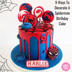 there is a spiderman birthday cake on the table