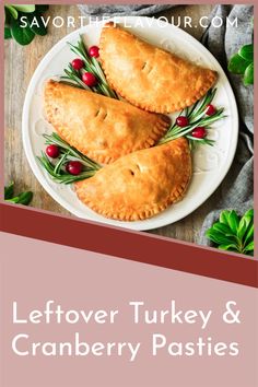 leftover turkey and cranberry pasties on a white plate with greenery