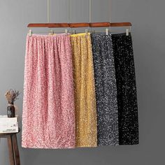 Womens Shimmering Sequin Maxi Skirt Collection Glamorous Long Skirt For Festive Occasions, Glamorous Long Festive Skirt, Glamorous Long Sequin Skirt, Summer Midi Skirt With Sequins, Summer Sequin Midi Skirt, Summer Festive Sequined Skirt, Sequin Pencil Mini Skirt For Party, Long Party Skirt With Sequins, Party Midi Skirt With Sequins