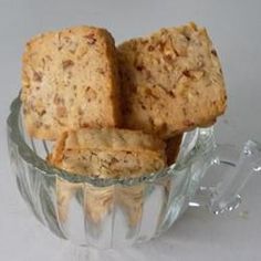 some food is in a glass bowl on a table