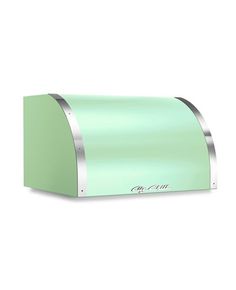 a green toaster sitting on top of a white counter