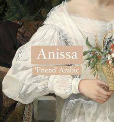 a woman holding a basket with flowers in it's hands and the words, anissa friend arabic