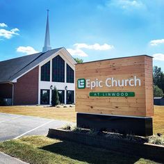 a church with a sign in front of it that says epic church at linwood