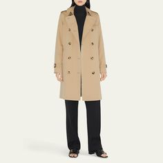 Burberry "Kensington" organic water-resistant gabardine trench coat featuring signature check lining and undercollar Trench collar with throat latch; double-breasted front Long sleeves; belted cuffs Chest gun flap; back rain shield Belted waist Shoulder epaulets Side flap pockets Straight fit Knee length Center-back vented hem Organic cotton Made in United Kingdom Classic Office Pea Coat With Belted Cuffs, Classic Outerwear With Notch Lapel And Belted Cuffs, Classic Pea Coat With Belted Cuffs For Work, Classic Gabardine Outerwear With Double-breasted Fastening, Classic Double-breasted Gabardine Outerwear, Classic Double-breasted Outerwear With Belted Cuffs, Classic Tailored Outerwear With Belted Cuffs, Classic Outerwear With Belted Cuffs, Classic Gabardine Outerwear For Office