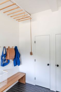 there is a coat rack on the wall