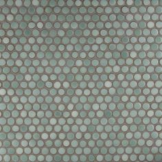 a gray and white tile with circles on it