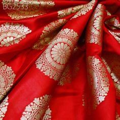 Red Brocade Fabric by the Yard Indian Wedding Dresses Varanasi Silk Crafting Sewing Costume Lehenga Valances Drapery Blouses Upholstery. This is a beautiful pure banarasi brocade in mandala design fabric in Red and Gold ➤Product: Brocade Fabric ➤Fabric Type: Blended (Viscose + Rayon) Fine Quality Zari Brocade Weaving from Banaras ➤Color: Base color is Red and Gold. ➤Width: 42 Inches ➤Condition: New  ➤Code: bg2533 ➤Listing for 1 Yard of fabric. ➤Care: Dry Clean Only Super Fine Quality Brocade Weaving from Banaras. During the Mughal period (1556-1707), when brocade was extremely popular with the rich, the great center of brocade weaving were Benares (Vārānasi). You can use this fabric to make Dresses, Tops, Blouses, Jackets, Crafting, Clutches or Evening Bags, Embellish your clothes, Pillows Red Floor-length Dupatta With Motifs, Red Embroidered Fitted Fabric With Motifs, Red Traditional Wear For Marriage, Red Traditional Marriage Wear, Floor-length Traditional Wear With Dupatta For Marriage, Red Festive Lehenga For Marriage, Red Traditional Wear With Pallu For Marriage, Traditional Red Embroidered Floor-length Fabric, Bollywood Style Fabric With Traditional Patterns For Wedding