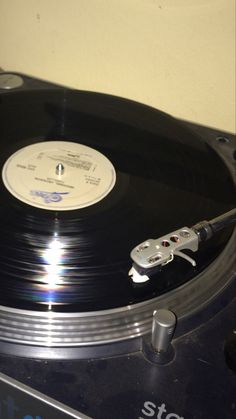 an old record player with its turntable removed