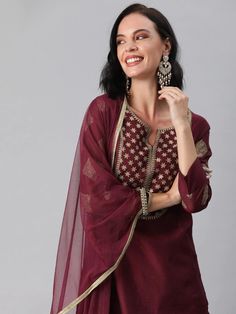 Maroon yoke design kurta with palazzos and dupattaMaroon zari sequinned yoke design straight calf length kurta, has a round neck, three-quarter sleeves, side slitsMaroon solid palazzos, has partially elasticated waistband, slip-on closureMaroon solid dupatta, has zari taping border Festive Semi-stitched Straight Kurta Salwar Kameez, Unstitched Straight Kurta With Dabka Work For Festive, Festive Unstitched Suit With Dabka Work And Straight Kurta, Unstitched Straight Kurta Palazzo Set With Gota Work, Eid Straight Kurta Set With Gota Work, Semi-stitched Festive Sharara, Eid Gota Work Straight Kurta Set, Chanderi Palazzo Set With Dabka Work For Eid, Festive Straight Kurta With Dabka Work