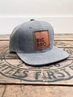 "Big Bro Snapback Hat for baby/toddler, youth or adult. These Big Brother caps are great for a pregnancy announcement or reveal, new baby gift for the big brother or to keep your son looking styling while showing off his big brother status! High quality, stylish and durable to hold up to the hat loving boys in your life! These caps are sure to be a loved and treasured gift! Sizing: On average our hats will fit the age ranges specified below with the ability to adjust the Snapback as your child g Adjustable Flat Bill Baseball Cap, Pregnancy Announcement Big Brother, Brother Status, Pregnant With Boy, Baby Pregnancy Announcement, Big Brother Gift, Mens Cap, Hat For Baby, Fawn Design