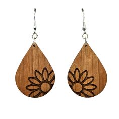 Wood earrings in a teardrop shape engraved with one Big Floral Daisy on the edge handcrafted in the USA in a small father and daughter wood shop in Northern California.Nickel Free Wire HooksFinished Wood on Both Sides1.5" x 1" x .125" thickThis is not the exact pair of dangle hook earrings that will be shipped. Wood grain and coloring will vary with each piece. Backs may have some black burn/kind of pock marks. Please see pictures for a couple of examples.Here at Happy Wood Products, we also offer wholesale and bulk discounts. Please feel free to follow us on social media for new releases, sales announcements, and more.0524 Teardrop Flower Earrings Gift, Teardrop Flower Pierced Earrings Gift, Engraved Teardrop Earrings For Gift, Adjustable Teardrop Flower Earrings, Brown Long Drop Earrings For Gift, Pierced Teardrop Pendant Earrings As Gift, Pierced Teardrop Pendant Earrings For Gift, Everyday Teardrop Pendant Pierced Earrings, Everyday Pierced Teardrop Pendant Earrings