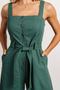 Baltic Born exclusive style Adorable jumpsuit for a day out on the town Deep Kelly green color Linen blend material has no stretch Straight neckline Functional buttons down bodice Tank sleeves Hidden pockets on both sides Removable self-tie belt at waist Wide-leg pant style Unlined Trina is 5'6, cup size 32D, size 2 and is wearing size S Green Overall Jumpsuit For Day Out, Fitted Green Jumpsuits And Rompers For Day Out, Fitted Green Jumpsuits For Day Out, Green Buttoned Jumpsuits And Rompers, Green Jumpsuits And Rompers For Work With Button Closure, Green Jumpsuits And Rompers For Day Out, Green Cotton Jumpsuits And Rompers With Button Closure, Baltic Born, Green Jumpsuit