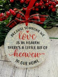 a christmas ornament that says because someone we love is in heaven there's a little bit of heaven in our home