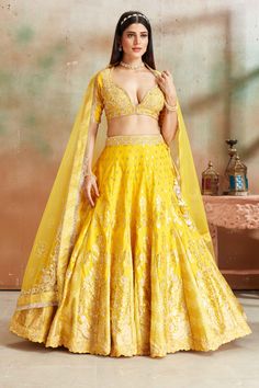 Shop yellow embroidered Banarasi silk lehenga online in USA with dupatta. Look your best on festive occasions in latest designer saris, pure silk sarees, Kanjivaram silk sarees, handwoven saris, tussar silk sarees, embroidered saris from Pure Elegance Indian clothing store in USA.-full view Yellow Raw Silk Choli With Intricate Embroidery, Yellow Sets With Meenakari For Diwali, Yellow Dola Silk Dupatta For Reception, Yellow Meenakari Sets For Festive Occasions, Bollywood Style Yellow Sharara With Meenakari, Festive Yellow Sets With Meenakari, Yellow Banarasi Silk Lehenga With Zari Work, Yellow Dola Silk Traditional Wear With Meenakari, Yellow Dola Silk Traditional Wear For Reception