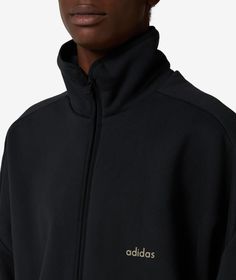 Founded in the 1940s, adidas has become a global leader in sportswear, known for its innovative designs and commitment to performance.This adidas Track Jacket x Fear of God Athletics in black is a standout piece from the Fall/Winter 2024 collection. The collaboration with Fear of God brings a unique edge to this sporty jacket, perfect for adding a touch of style to your athletic wardrobe. Don't miss out on this exclusive piece, available now at SVD. Sporty Jacket, Adidas Track Jacket, Brand Collaboration, Adidas Track, Fear Of God, Unique Aesthetic, 2024 Collection, Winter 2024, Track Jacket