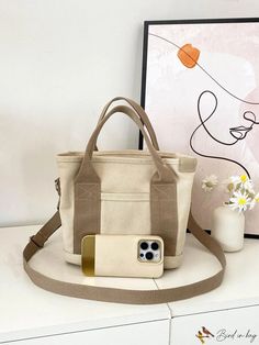 BirdinBag - Versatile Canvas Crossbody Bag: Ideal Medium Work & Travel Handbag with Multiple Pockets Large Capacity Beige Bags For School, Beige School Bag With Large Capacity, Canvas Bucket Satchel With Top Carry Handle, Large Capacity Beige Canvas Satchel Bag, Beige Large Capacity Canvas Satchel Bag, Large Capacity Beige Canvas Satchel, Beige Canvas Shoulder Bag For School, Versatile Canvas Bags With Removable Pouch, Trendy Canvas Mobile Phone Bag