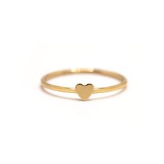 A modern tiny heart on a classic thin band. A must-have for Stacker Rings. Thick 14K Gold plating will make this ring last a lifetime! Gold Vermeil Hypoallergenic, lead and nickel free Heart Height 3.5mm Band 1mm #R108 Rings Thick, Gold Heart Ring, Stacker Rings, Tiny Heart, Mini Heart, Small Heart, Heart On, Gold Plating, Gold Vermeil