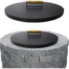 an outdoor fire pit is shown with the top and bottom section showing it's black surface