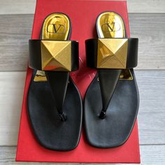 Valentino Garavani Roman One Stud Black Thong Sandal Size 37/7 New With Box And Dust Bag Retail For $890 Plus Tax Description Valentino Garavani One Stud Flat Thong Sandal In Calfskin With Maxi Stud Embellishment. - 4x4 Cm / 1.6x1.6 In. Antique Brass-Effect Maxi Stud - Heel Height 5 Mm / 0.2 In. - Made In Italy Designer Black Toe Post Sandals, Designer Toe Post Sandals For Formal Occasions, Valentino Garavani Shoes, Studded Flats, Studded Heels, Food Obsession, Womens Rights, Thong Sandals, Hand Bag