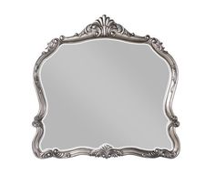 an ornate silver framed mirror on a white background