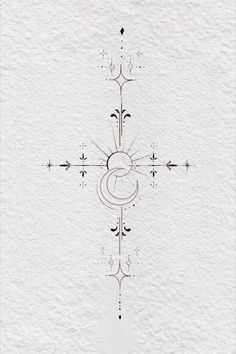 the cross is drawn in black ink on white paper with an intricate design and decorative elements