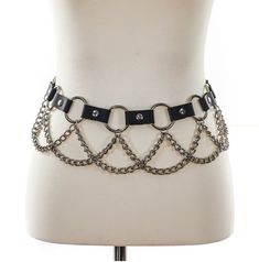 High Quality Leather Belt featuring mid-sized, linked, shiny silver (plated) rings with chains in bewtween. Pure rock n roll, killer with leggings or your favorite mini skirt. MeOw. Black Leather Made in the USA How to Tell Your Waist Size: A regular waist belt should be 2" larger than your pants size. If you are going to wear this on the hips, it should be even larger than that. Like 4" larger than your waist size. Rings With Chains, Chain Belts, Ring Chain, Chain Belt, Chain Ring, Shiny Silver, Rock N, Waist Belt, High Quality Leather