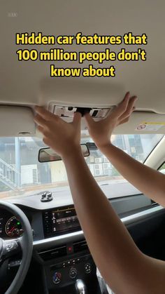 a person driving a car with the text hidden car features that 100 million people don't know about