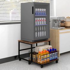 a beverage dispenser sitting on top of a cart next to a counter